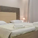 Delfini Beach Hotel & Suites